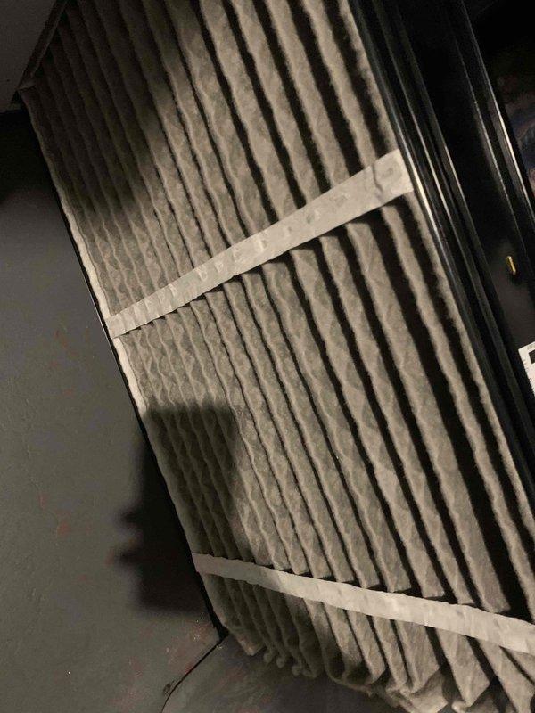 Responded to service call for furnace not producing heat. Replaced damaged burner assembly and installed new air filter to restore system functionality. Unit is now operating correctly with proper airflow and heat generation.