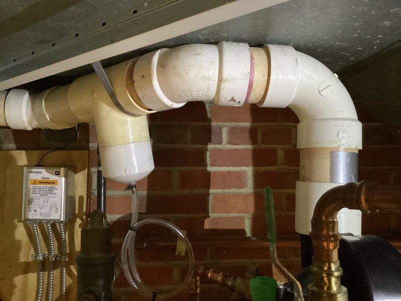 Installed new ductwork to supply HVAC service to second floor room. Work included positioning and securing black R-8 insulated cylindrical duct with proper connections to existing system. Completed installation with fiberglass insulation around ductwork to ensure optimal thermal efficiency.