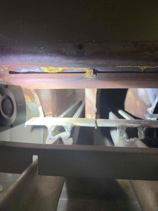 Performed diagnostic inspection on furnace with no heat complaint. Identified significant corrosion and oxidation on heat exchanger components. Visual inspection using digital equipment confirmed presence of deterioration on critical surfaces. Adjusted burner assembly and verified pilot operation to restore proper heating function.
