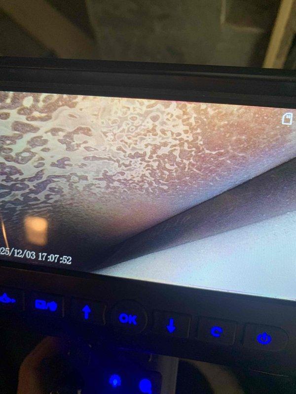 Performed diagnostic inspection on furnace with no heat complaint. Identified significant corrosion and oxidation on heat exchanger components. Visual inspection using digital equipment confirmed presence of deterioration on critical surfaces. Adjusted burner assembly and verified pilot operation to restore proper heating function.