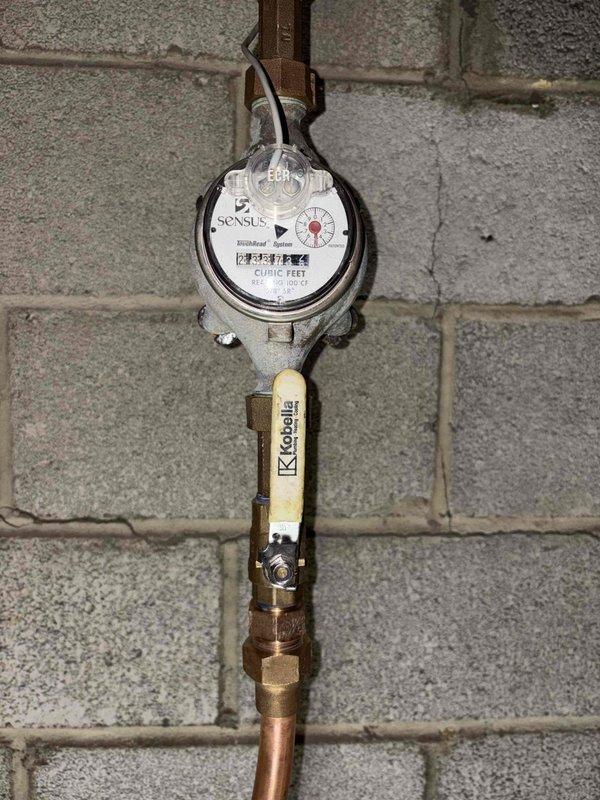 Completed replacement of pre and post meter emergency shut-off valves after city water service was turned off as scheduled. Removed deteriorated valve components showing significant mineral buildup and installed new Kioville ball valve. Verified proper installation and functionality of all connections to the Sensus water meter.
