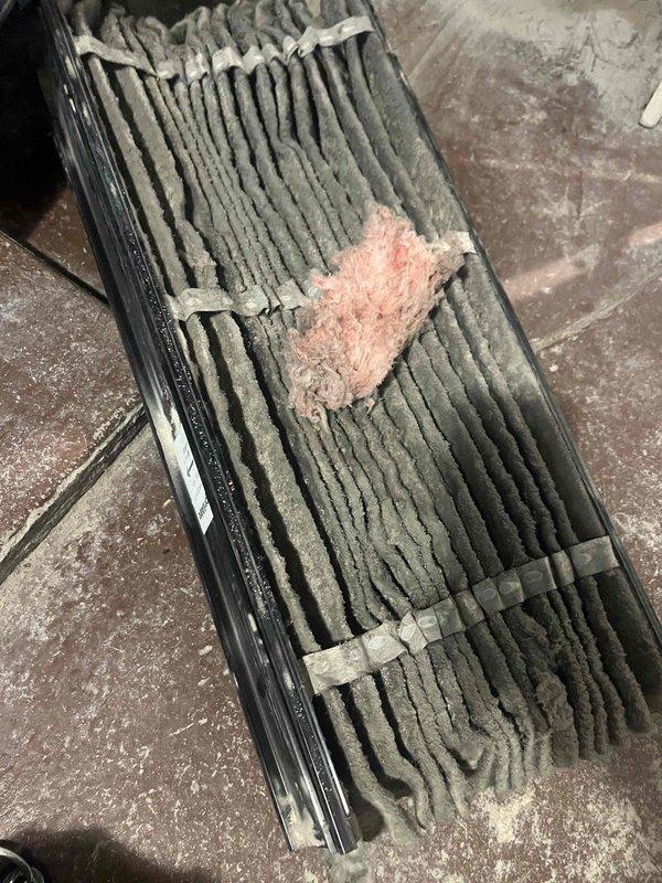 Responded to callback after steam humidifier installation where customer reported inadequate heating (system set at 70° but only reaching 65°). Upon inspection, discovered severely clogged air filter restricting proper airflow. Replaced filter and verified system operation, restoring normal heating function.