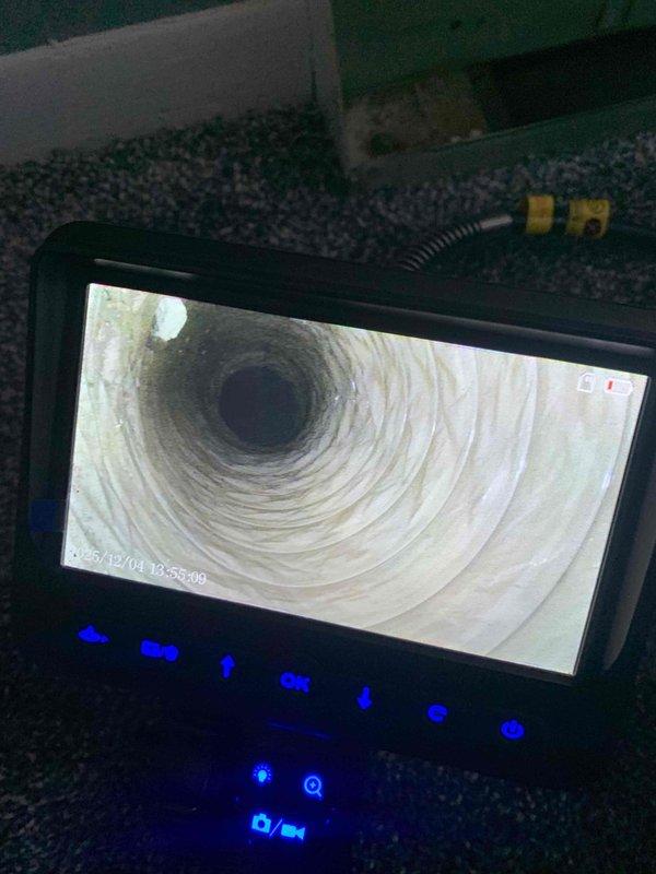 Investigated complaint of cold air from one vent using borescope inspection camera to examine ductwork interior. Found damaged flexible ducting with compromised insulation and structural integrity where it connects to the wall. Presented customer with estimate (previously prepared by Sam) for repair/replacement of the affected ductwork section.
