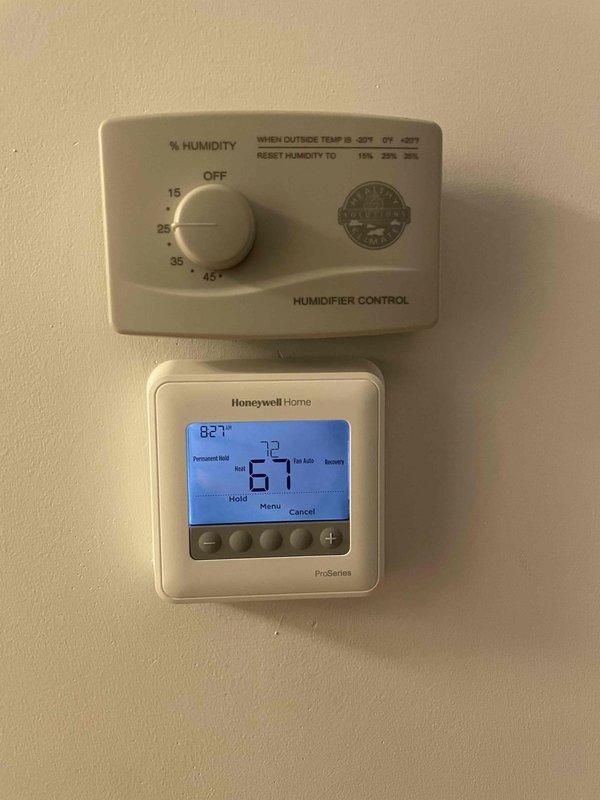 Performed heating maintenance service on member's dual air handler system. Inspected and documented condition of pleated air filters in the filter assembly. Checked humidistat control settings (currently between OFF-15%) and verified operation of Honeywell ProSeries thermostat (67° current/82° setpoint).