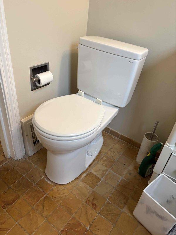 Returned to property to auger drain line and replace toilet previously sold by Homer. Located sewer line with locator device at 4'3" depth and completed drain cleaning service. Installed new toilet with proper connections and verified proper operation.