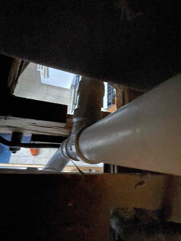 Returned to property to cut open kitchen ceiling for access to upstairs shower drain line as previously quoted. Inspected PVC piping connections in ceiling cavity and identified shower drain configuration for future repair work.