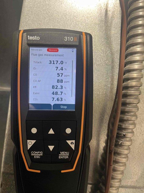 Performed diagnostic service on 6-year-old Carrier furnace reporting no heat with thermostat flashing orange three times. Combustion analysis with Testo 310 revealed acceptable efficiency at 82.3% but elevated CO levels (57 ppm) with excess air at 48.7%. Cleaned flame sensor and checked gas pressure to restore normal heating operation.