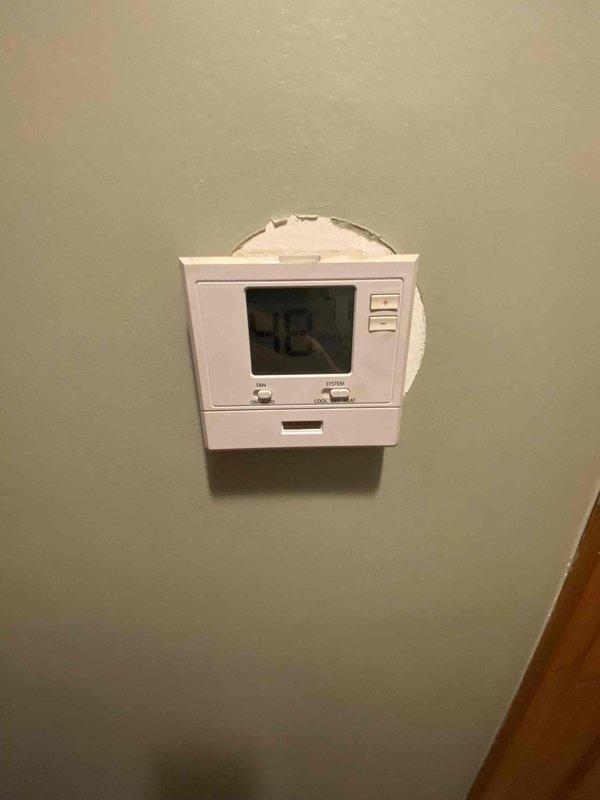 Performed comprehensive diagnostic assessment of Dunkirk boiler system with cabinet open to examine internal electrical components and control wiring. Thermostat reading showed 42 degrees, indicating potential system failure or improper operation requiring further evaluation and possible replacement components.