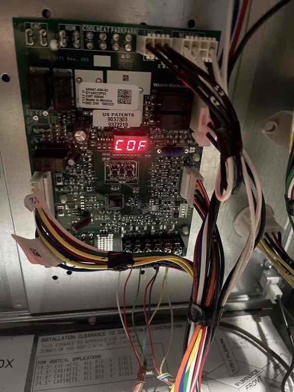 Responded to callback for non-functioning fan in manual mode on 65W air handler. Diagnosed issue with electronic control board showing "EOF" error code on display. Inspected and corrected electrical connections, focusing on the wire connections at junction points. System now functioning properly in all modes.