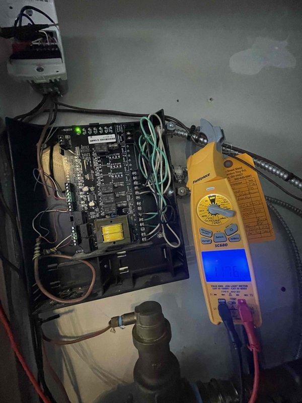 Diagnosed and serviced snow-melt system for driveway that was non-operational with control panel indicating error via blinking lights. Performed electrical testing with multimeter on control board connections and verified proper voltage to system components. Traced issue to faulty zone valve actuator controlling driveway loop while confirming garage and sidewalk zones remained functional.