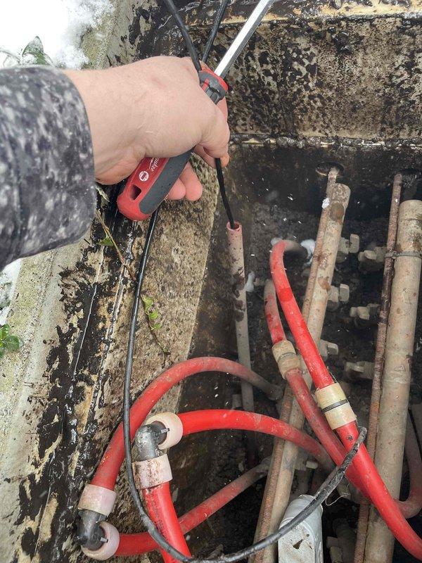 Diagnosed and serviced snow-melt system for driveway that was non-operational with control panel indicating error via blinking lights. Performed electrical testing with multimeter on control board connections and verified proper voltage to system components. Traced issue to faulty zone valve actuator controlling driveway loop while confirming garage and sidewalk zones remained functional.