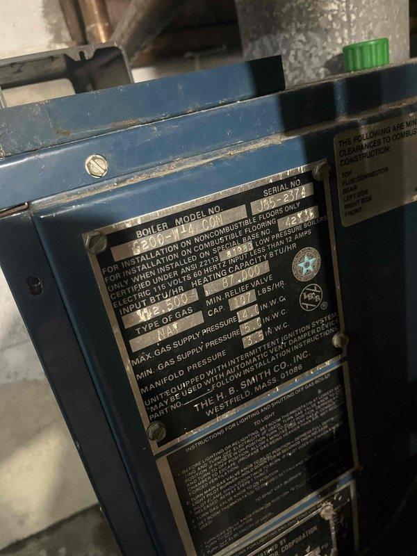 Responded to service call for a non-operational boiler system. Visual inspection revealed low pressure readings on the pressure gauge. Unit identified as H.B. Smith model 120-TOPN (serial #125-2172) showed signs of age and wear. Diagnosed issues and provided client with options for repair of current system and complete replacement.