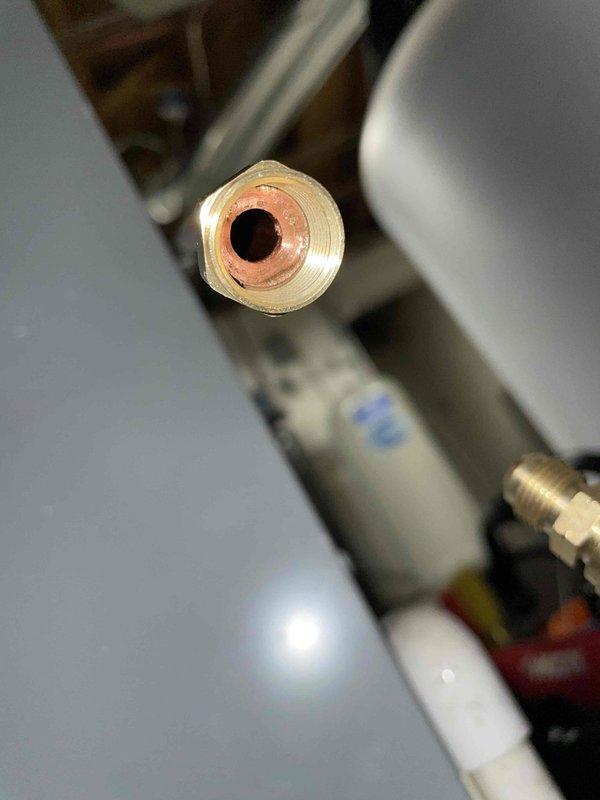 Returned to complete previously sold repair work to replace a failing oil union. Successfully removed the old brass fitting and installed a new copper-brass union on the line, ensuring proper connection and sealing. Tested the system after installation to confirm no leaks and proper operation.