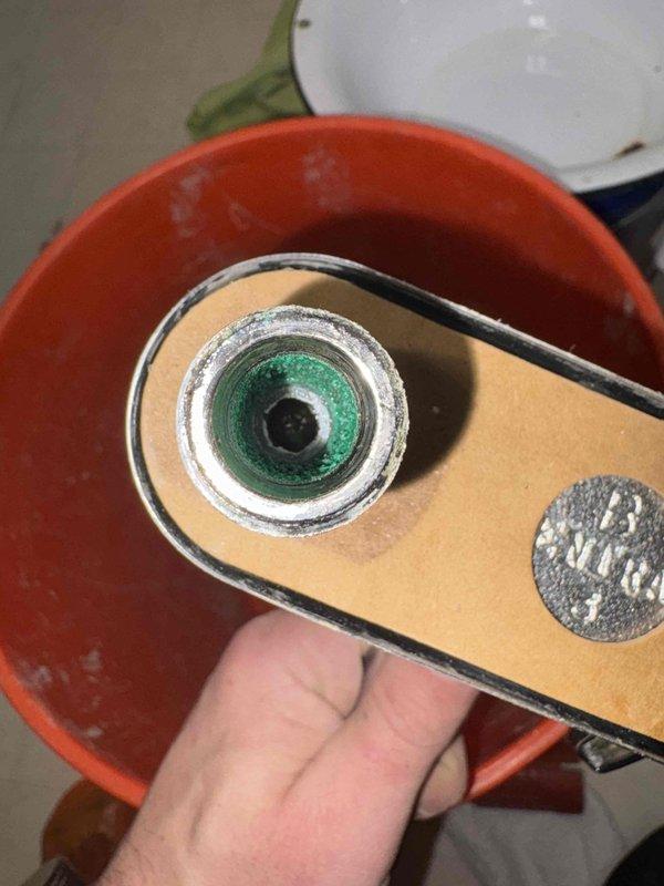 Repaired leaking hot water faucet in laundry tub. Used pipe cutter to access affected area and installed pressure gauge to verify system pressure after repair was completed. Successfully eliminated leak and restored normal water flow.