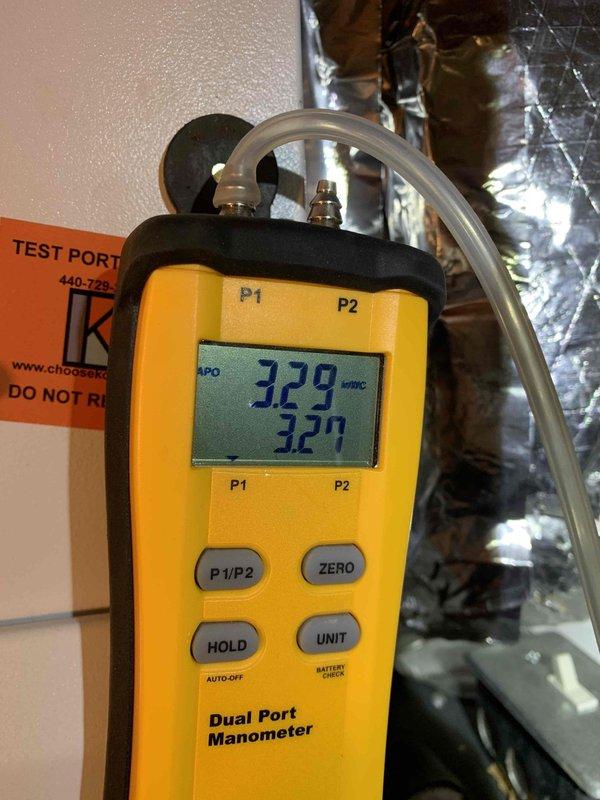 Responded to cooling issue where thermostat was set to 78°F but space temperature was 72°F with system blowing cold air. Performed gas pressure verification using dual port manometer (readings 327-329 inH2O and 4.28" WC) and adjusted fan speed on air handler to correct the performance issue.