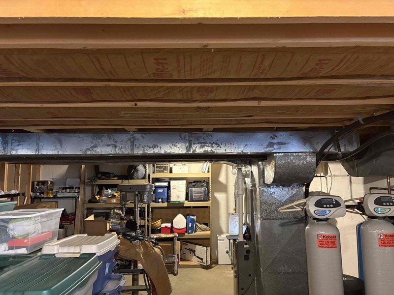Completed lead transfer from Sam for full HVAC system replacement. Inspected electrical connections at junction box and verified proper wiring. Documented existing ductwork condition and water treatment system location for system integration planning.