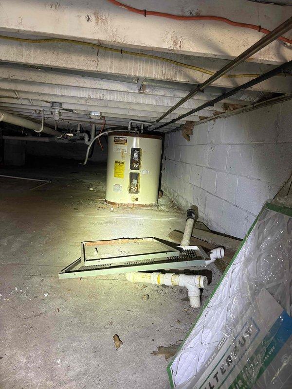 Installed customer-supplied electric water heater in crawl space. Removed old unit and connected new Rheem water heater to existing plumbing and electrical systems. Completed connections to supply lines and verified proper operation before finalizing installation.