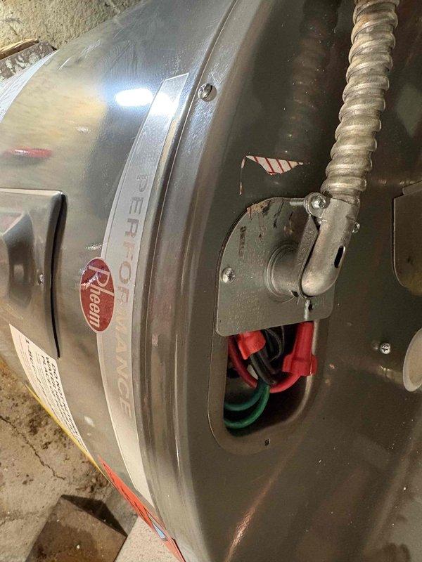 Installed customer-supplied electric water heater in crawl space. Removed old unit and connected new Rheem water heater to existing plumbing and electrical systems. Completed connections to supply lines and verified proper operation before finalizing installation.