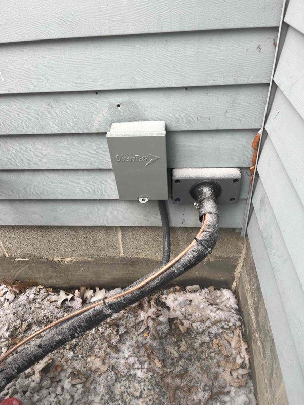 Successfully installed a complete American Standard "All Weather" system as approved by GS. Installed new exterior electrical junction box (Diversitech) with proper conduit and connections. Unit was properly mounted on concrete pad with all necessary electrical connections completed according to manufacturer specifications.