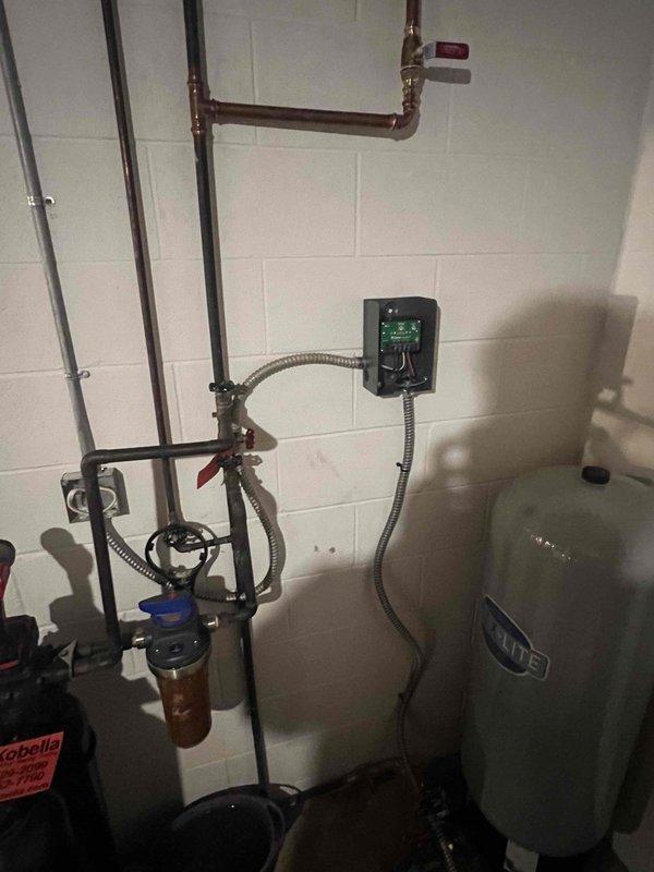 Returned to customer's residence to complete installation of previously sold pump and tank saver system. Successfully installed pressure switch and connected necessary electrical components to the existing water pressure system. System was properly integrated with the home's plumbing infrastructure including connection to filtration equipment and pressure tank, with all components tested and confirmed operational.