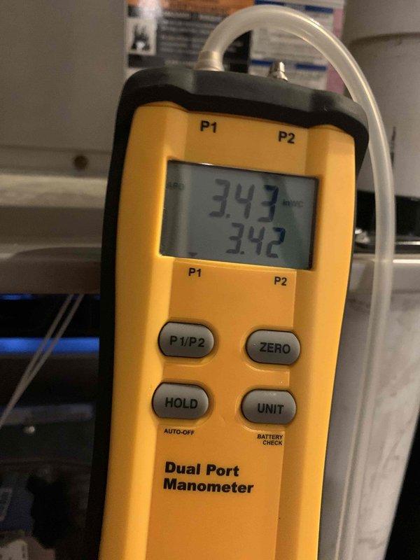 Conducted annual heating maintenance for club member with air handler system. Performed pressure testing with dual port manometer, recording readings of 343/342. Completed electrical system diagnostics using Fieldpiece SC480 multimeter, confirming proper voltage at 47.18V. All systems operating within normal parameters.