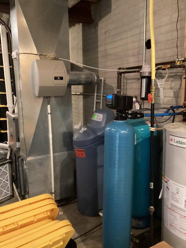Performed inspection of existing HVAC system in basement utility room. Unit identified as Lennox model C33-60D-2F-2 refrigerant evaporator/heat pump section. Customer was referred through home warranty program and may be interested in AC replacement options.