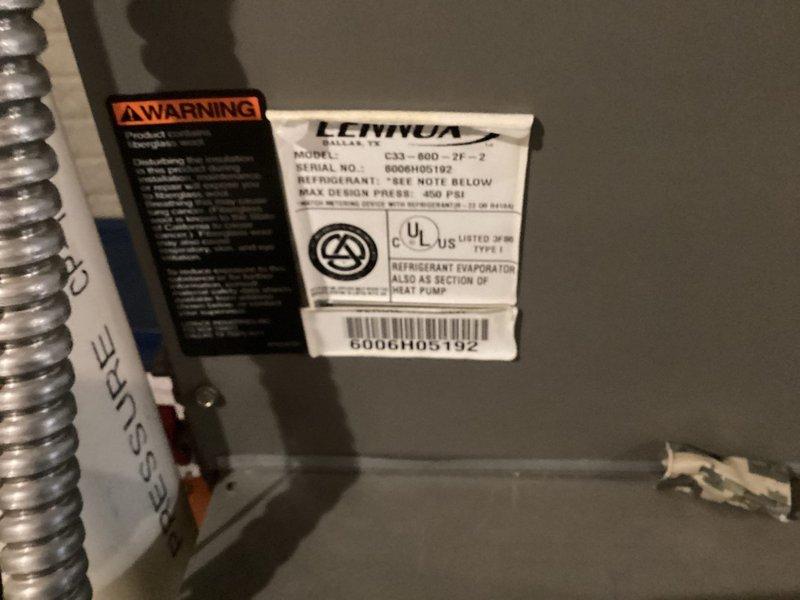 Performed inspection of existing HVAC system in basement utility room. Unit identified as Lennox model C33-60D-2F-2 refrigerant evaporator/heat pump section. Customer was referred through home warranty program and may be interested in AC replacement options.