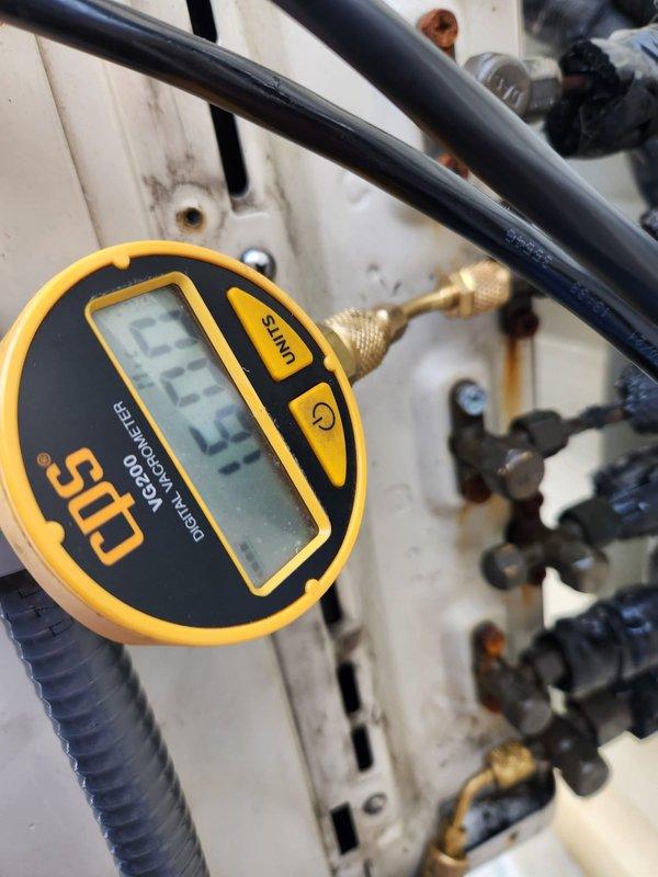 Performed leak detection on a mini-split system after removing compressor per Brad's instructions. Pressure testing revealed readings of 59.0 and 25.4 PSI at different points in the system. Inspected all braze joints for refrigerant leaks as requested.