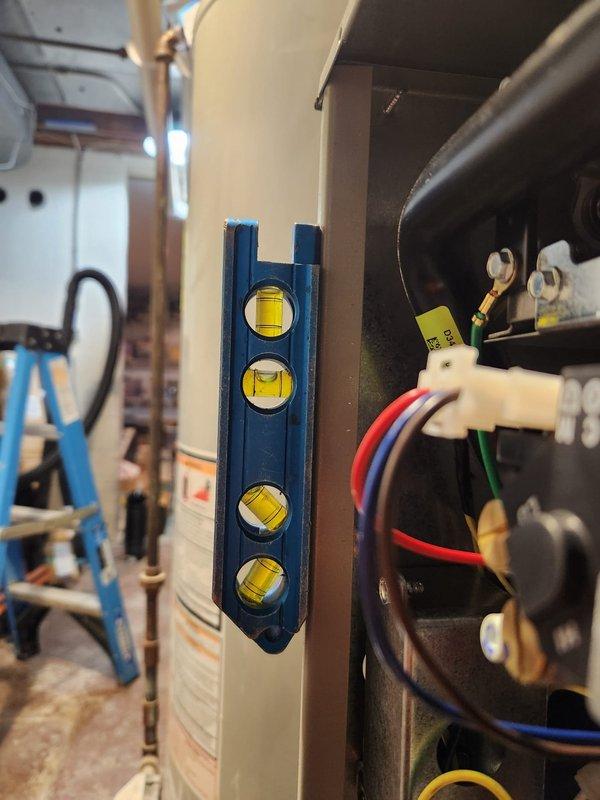 Completed full system installation as scheduled with customer Mandy. Performed comprehensive leveling of equipment using spirit level to ensure proper alignment. Connected electrical components with appropriate wiring to terminal blocks. Installed and configured new furnace/air handler with associated ductwork, along with water heater system. Verified all piping connections including PVC drain lines and copper supply lines with expansion tank setup. All systems tested and confirmed operational upon completion.