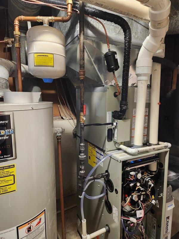 Completed full system installation as scheduled with customer Mandy. Performed comprehensive leveling of equipment using spirit level to ensure proper alignment. Connected electrical components with appropriate wiring to terminal blocks. Installed and configured new furnace/air handler with associated ductwork, along with water heater system. Verified all piping connections including PVC drain lines and copper supply lines with expansion tank setup. All systems tested and confirmed operational upon completion.