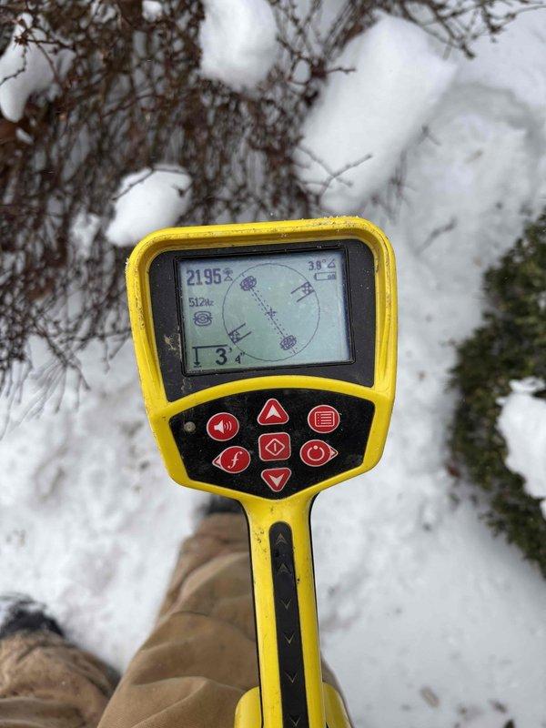 Responded to service call for clogged garage floor drain. Utilized electronic locating equipment to detect drain line position and depth (measured at 3'4"). Successfully cleared obstruction during after-hours service.
