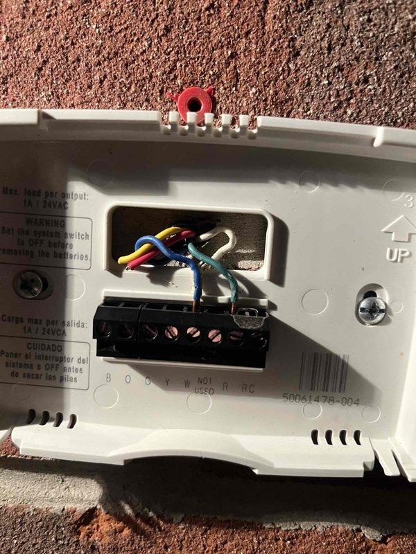 Conducted assessment of ceiling mounted gas furnace serving DZ indoor swimming pool area. Inspected electrical connections in utility room, including wiring junction box and associated plumbing systems. Evaluated thermostat wiring configuration and terminal connections for replacement recommendation.