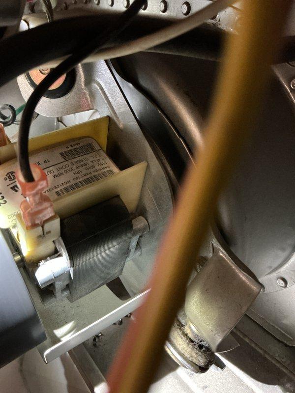 Responded to no-heat call for furnace system. Diagnostic testing with multimeter revealed faulty inducer motor (reading 0.9). Replaced inducer motor assembly and verified proper system operation.