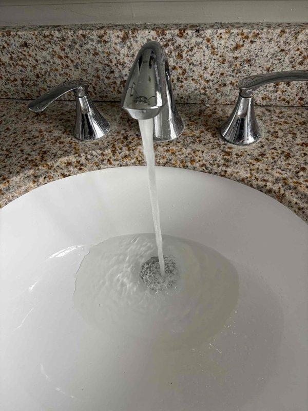 Responded to emergency call from Andrew Goldsword regarding frozen pipes. Upon inspection, accessed crawl space to assess plumbing system where significant cobweb accumulation was observed. Successfully thawed frozen pipes, restoring normal water flow to bathroom fixtures. Verified proper operation by testing sink faucet, which demonstrated appropriate water pressure and function.