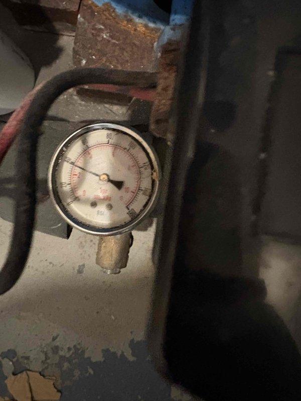 Responded to service call regarding water pressure switch issue where tank was not consistently filling. Upon inspection, identified faulty pressure switch as evidenced by low gauge reading. Replaced pressure switch and verified proper water tank filling operation. System now functioning correctly with appropriate pressure levels maintained.