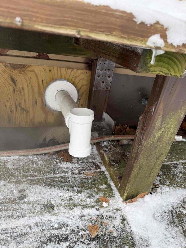 Responded to service call for non-operational furnace. Performed level assessment of boiler system and inspected exterior plumbing connections. Identified improper drainage slope in condensate line and evidence of moisture damage to structural components. Corrected pitch of drain line to ensure proper condensate removal and restore system functionality.