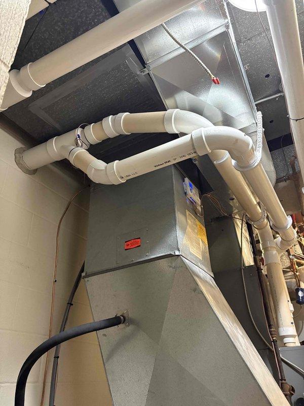 Conducted an estimate for replacement of existing furnace. Assessed current HVAC system installation in utility area, noting condition of existing unit, ductwork, and PVC ventilation configuration. Verified compatibility with current Honeywell digital thermostat system which is functioning properly with heat mode operational.