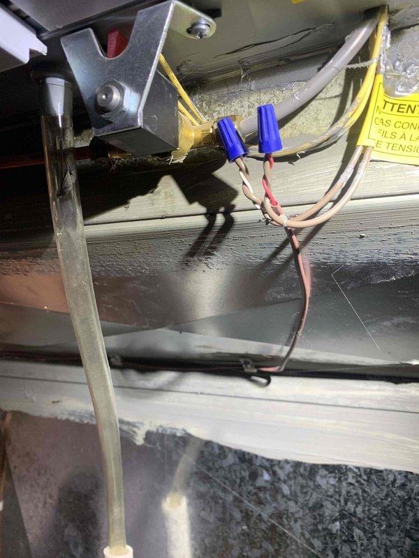 Responded to customer concern regarding non-functioning humidifier that was installed in September. Upon inspection, verified electrical connections at the humidifier control panel and confirmed proper wiring installation with the humidistat showing green indicator light. System is now operational.