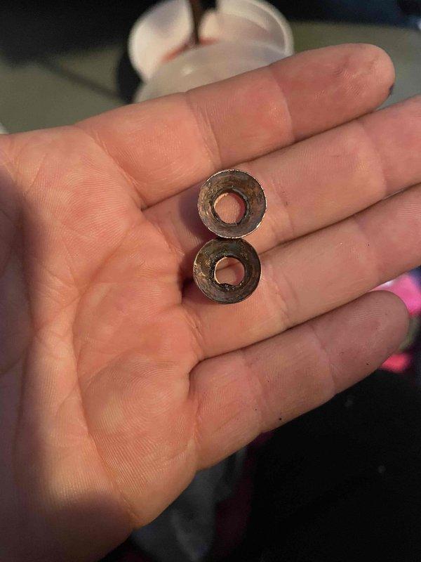 Inspected oil furnace reporting black soot issues. Identified pump seal failure as the source of the problem, evidenced by deteriorated seals that were removed and documented. Performed system flush with cleaning solution to remove contaminants before installing replacement seals.