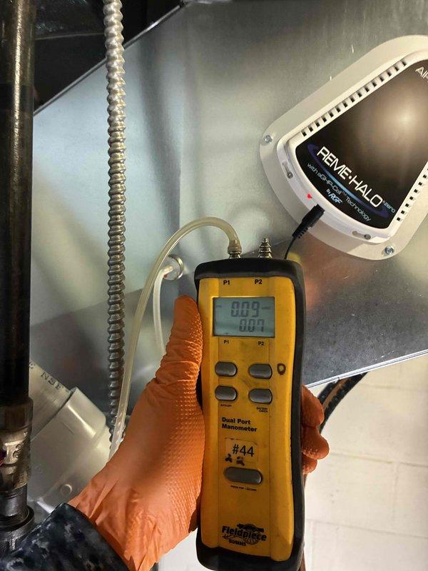 Completed installation of new HVAC system in basement utility room, which included mounting the furnace unit with PVC ventilation piping, connecting insulated copper lines, and installing all necessary control components. Performed pressure testing with Fieldpiece Dual Port Manometer, confirming readings of 009/007, and verified proper installation of PRIMEHALO monitoring equipment for optimal system performance.