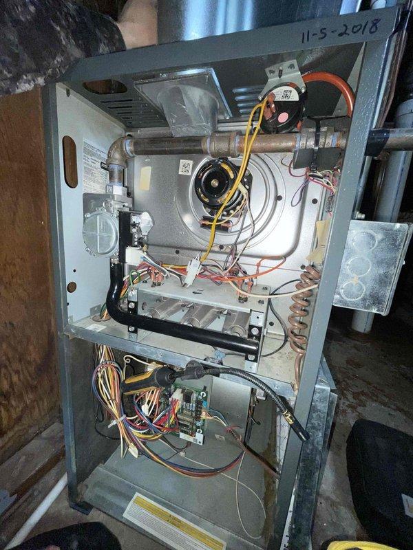 Diagnosed furnace failing to maintain temperature with pressure switch stuck open error (3 flash code). Inspected control board and internal components, noting the unit was installed in 2018. Recommended customer for Renew Club membership.