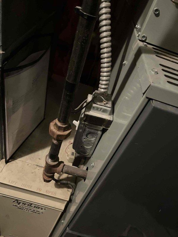 Responded to no heat call for Amana furnace. Investigated gas valve assembly and discovered faulty thermocouple connection causing pilot light failure. Replaced thermocouple and verified proper gas flow through the valve. Also inspected and secured loose PVC condensate drain connection with metal clamps to prevent future leakage. System now operating correctly with proper airflow through vents.