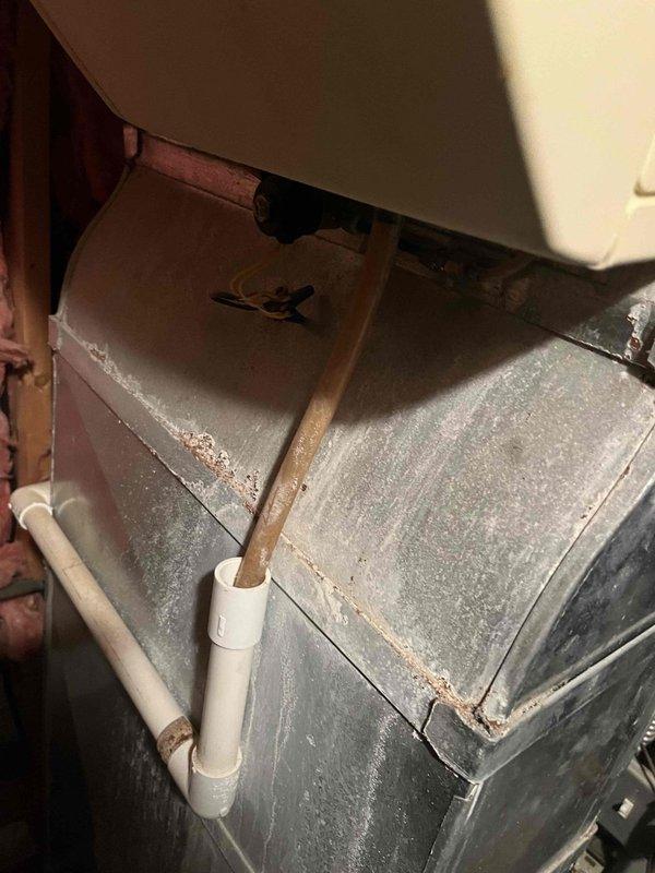 Responded to service call for a furnace failure where customer reported minimal airflow from vents. Upon inspection, identified need for complete furnace replacement. Removed existing unit showing significant corrosion and wear on housing and connections. Installed new furnace system including replacement of thermostat wiring and mounting hardware, ensuring proper leveling and connection of control wires.