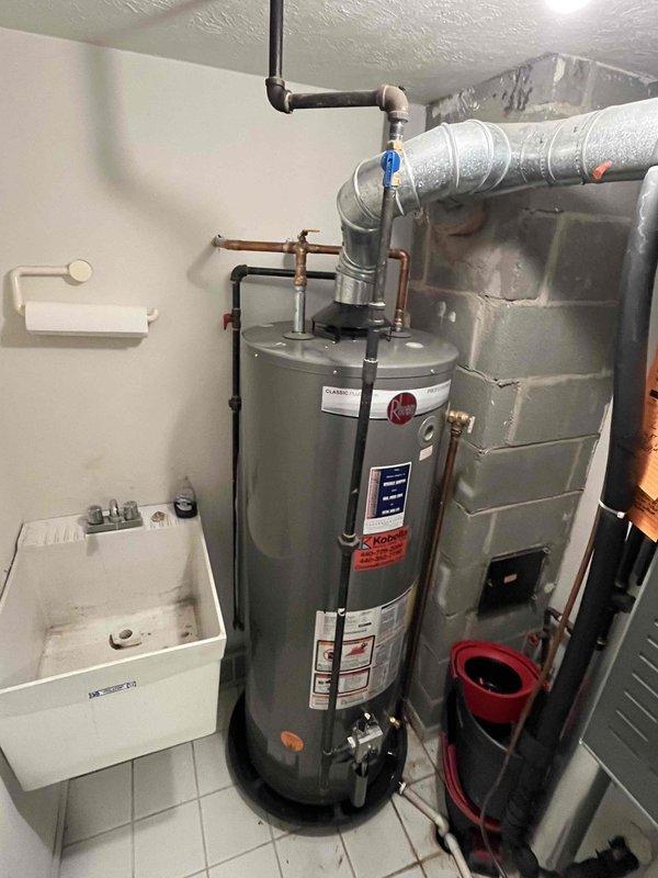 Responded to service call for no hot water in the residence. Diagnosed frozen water supply lines affecting the water heater system located in the utility closet. Thawed affected pipes using approved methods, restored water flow, and verified proper operation of the 5-year-old water heater unit. System now functioning correctly with normal hot water supply throughout the home.