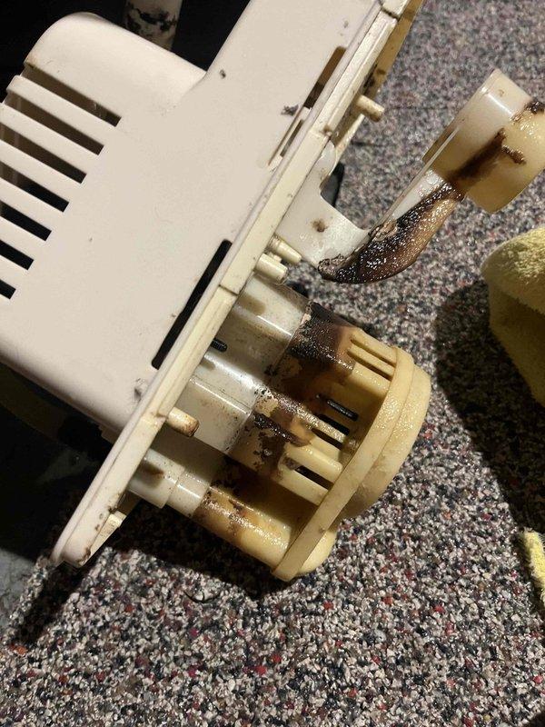 Responded to service call regarding water leakage from furnace drain line. Discovered condensate drain line blockage causing water to overflow into the drain pan. Identified and replaced damaged control board showing signs of thermal failure and corrosion damage, likely resulting from previous water exposure. System now operating normally with proper drainage restored.