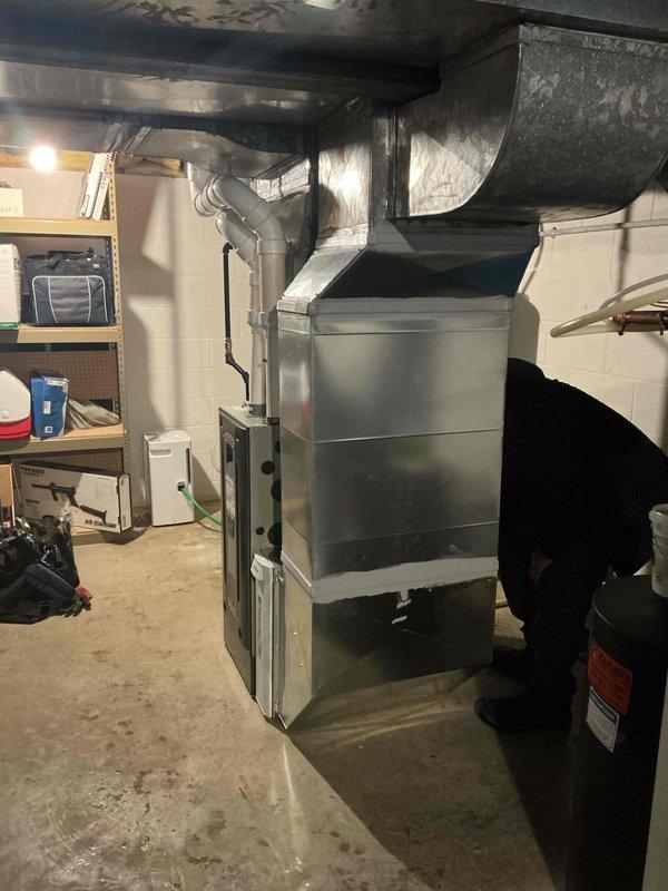 Completed installation of complete HVAC system in customer's basement, initially sold by Justin and project managed by Sam Kdz. System installation included furnace/air handler with proper ductwork connections to existing distribution system. Performed standard commissioning procedures, including refrigerant pressure verification (431-440 PSI) and temperature testing (114-156°F) using Fieldpiece SMAN digital manifold.
