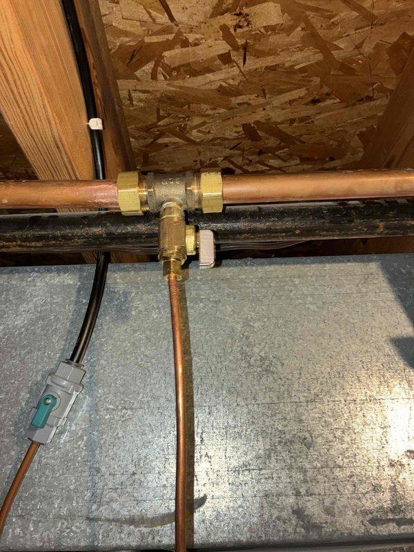 Returned to complete IAQ system installation as sold by Jondz. Successfully installed air quality components including the main control unit with dual sensors and integrated copper piping with brass T-junction connectors to existing HVAC system. System was properly secured to OSB sheathing with all electrical connections verified operational.