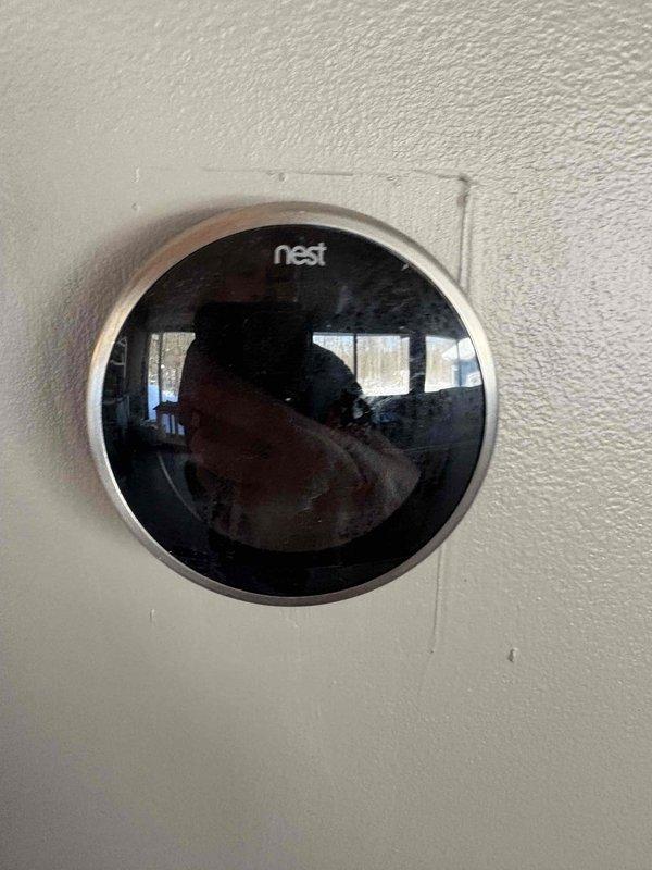 Inspected non-operational boiler unit requiring complete replacement. Verified electrical connections at furnace switch junction box and confirmed compatibility with existing Nest thermostat system for new installation.