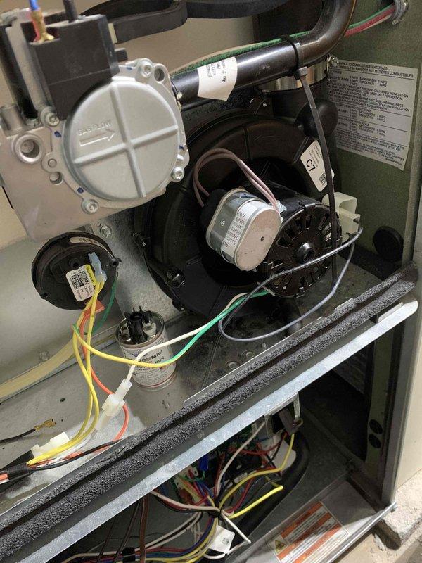 Replaced faulty inducer motor under warranty in customer's HVAC system. Performed complete installation of new motor, reconnected all electrical components, and verified proper operation after replacement. Unit is now functioning correctly with warranty-covered part installed as sold by Sam K.