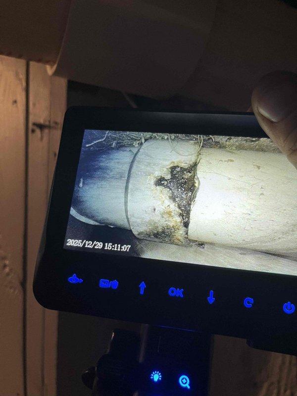 Investigated water drip from HVAC exhaust vents using inspection camera, which revealed deterioration at pipe joint with visible mold/corrosion. Inspected PVC drainage system and copper supply lines, addressing the leak at connection point to restore proper system operation.